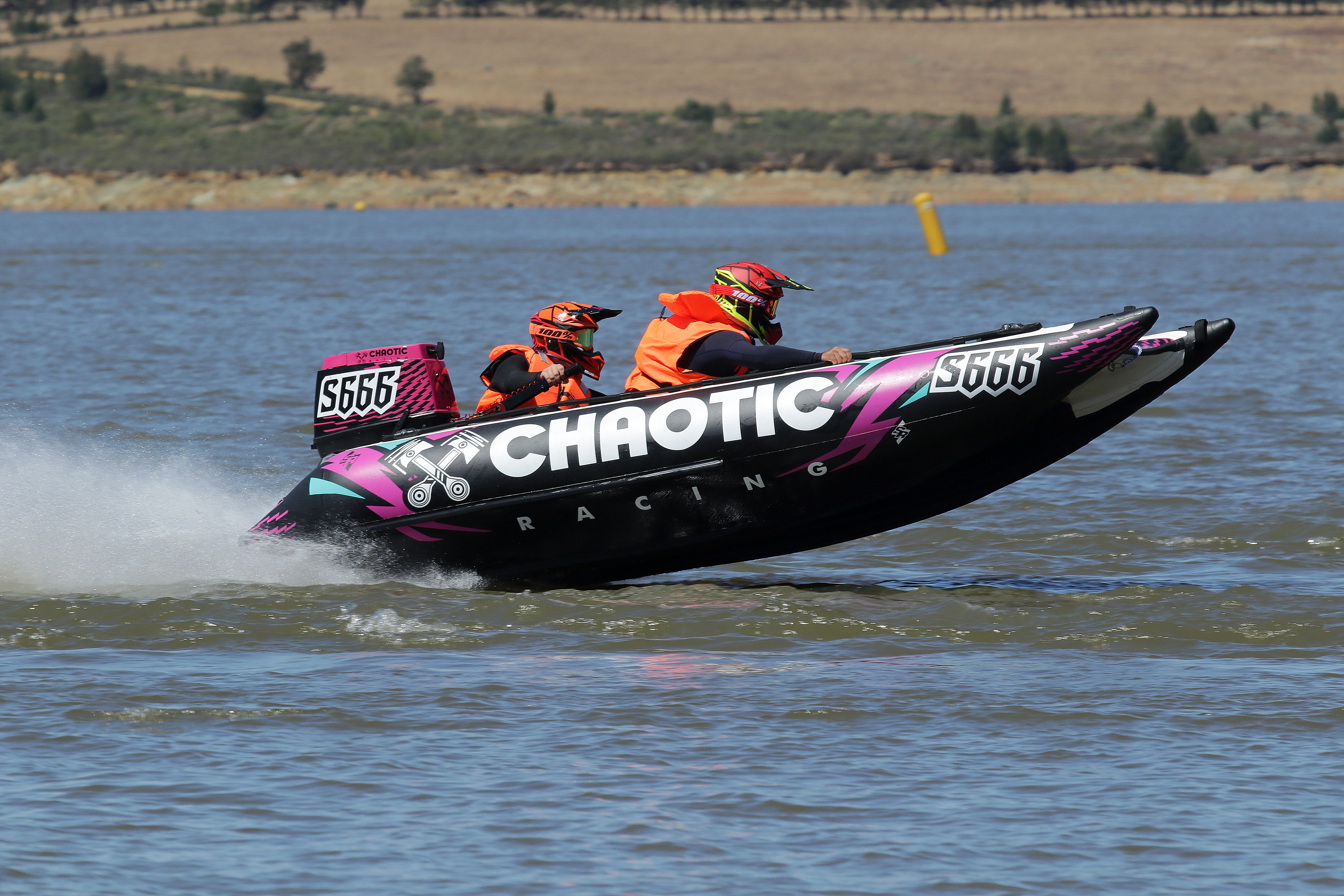 Chaotic Riot flat-water race catamaran catching air